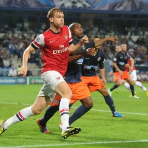 Per Mertesacker vs. Suleyman Camara: A Battle in the UEFA Champions League (Montpellier v Arsenal 2012-13) Per Mertesacker vs. Suleyman Camara: A Battle in the UEFA Champions League (Montpellier v Arsenal 2012-13)