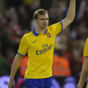 Per Mertesacker's Celebration: Arsenal's Capital One Cup Victory over West Bromwich Albion Per Mertesacker's Celebration: Arsenal's Capital One Cup Victory over West Bromwich Albion