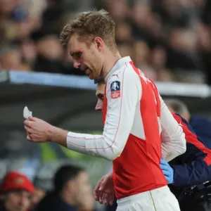 Per Mertesacker's FA Cup Exit: Head Injury Marred Arsenal's Match vs. Hull City (March 2016) Per Mertesacker's FA Cup Exit: Head Injury Marred Arsenal's Match vs. Hull City (March 2016)