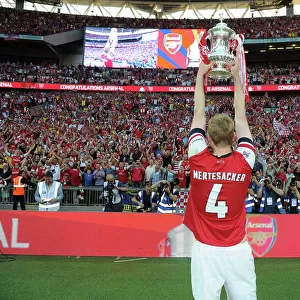 Per Mertesacker's Glory: Arsenal's FA Cup Victory at Wembley Stadium