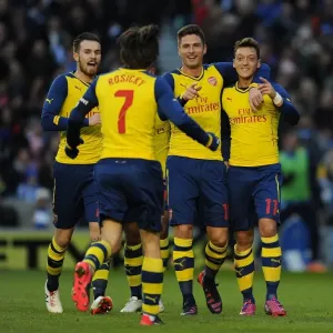 Mesut Ozil, Aaron Ramsey, Tomas Rosicky, and Olivier Giroud Celebrate Arsenal's Goals Against Brighton & Hove Albion in FA Cup Fourth Round Mesut Ozil, Aaron Ramsey, Tomas Rosicky, and Olivier Giroud Celebrate Arsenal's Goals Against Brighton & Hove Albion in FA Cup Fourth Round