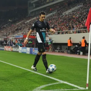 Mesut Ozil in Action: Arsenal vs. Olympiacos, UEFA Champions League, Athens 2015 Mesut Ozil in Action: Arsenal vs. Olympiacos, UEFA Champions League, Athens 2015