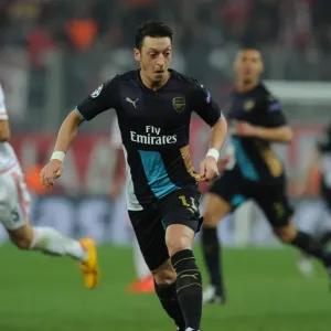 Mesut Ozil in Action: Arsenal vs. Olympiacos, UEFA Champions League, Athens 2015 Mesut Ozil in Action: Arsenal vs. Olympiacos, UEFA Champions League, Athens 2015