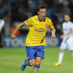 Mesut Ozil in Action: Arsenal vs. Olympique de Marseille, UEFA Champions League (2013-14) Mesut Ozil in Action: Arsenal vs. Olympique de Marseille, UEFA Champions League (2013-14)