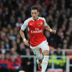 Mesut Ozil in Action: Arsenal vs. Tottenham Hotspur, Premier League 2015-16 Mesut Ozil in Action: Arsenal vs. Tottenham Hotspur, Premier League 2015-16