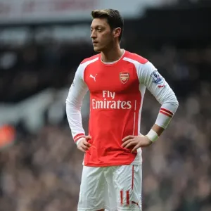 Mesut Ozil: In Action Against Tottenham in the Premier League, 2014-15 Mesut Ozil: In Action Against Tottenham in the Premier League, 2014-15