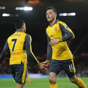 Mesut Ozil and Alexis Sanchez: A High-Fiving Moment at Middlesbrough's Riverside Stadium (Arsenal vs Middlesbrough, 2016-17) Mesut Ozil and Alexis Sanchez: A High-Fiving Moment at Middlesbrough's Riverside Stadium (Arsenal vs Middlesbrough, 2016-17)
