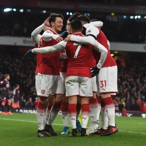 Mesut Ozil and Alexis Sanchez Celebrate Arsenal's Goals Against Huddersfield Town, 2017-18 Season Mesut Ozil and Alexis Sanchez Celebrate Arsenal's Goals Against Huddersfield Town, 2017-18 Season