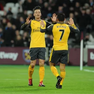 Mesut Ozil and Alexis Sanchez Celebrate Goal: West Ham United vs Arsenal, 2016-17 Premier League Mesut Ozil and Alexis Sanchez Celebrate Goal: West Ham United vs Arsenal, 2016-17 Premier League