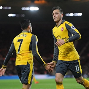 Mesut Ozil and Alexis Sanchez: A High-Fiving Moment at Middlesbrough's Riverside Stadium (Arsenal vs Middlesbrough, 2016-17)