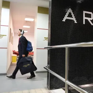 Mesut Ozil Arrives at Arsenal Changing Room Before Arsenal v Watford Match, 2018