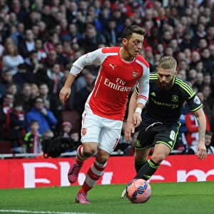 Mesut Ozil (Arsenal) Adam Clayton (Middlesbrough). Arsenal 2: 0 Middlesbrough. FA Cup 5th Round