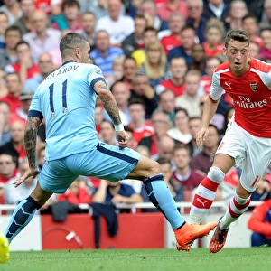 Mesut Ozil (Arsenal) Alexander Kolarov (Man City). Arsenal 2: 2 Manchester City. Barclays