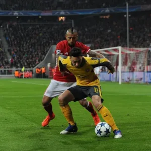 Mesut Ozil (Arsenal) Arturo Vidal (Bayern) Mesut Ozil (Arsenal) Arturo Vidal (Bayern)