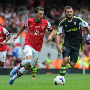 Mesut Ozil (Arsenal) Erik Pieters (Stoke). Arsenal 3: 1 Stoke City. Barclays Premier League Mesut Ozil (Arsenal) Erik Pieters (Stoke). Arsenal 3: 1 Stoke City. Barclays Premier League