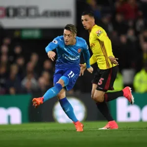Mesut Ozil (Arsenal) Jose Holebas (Watford). Watford 2: 1 Arsenal. Premier League