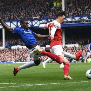 Mesut Ozil (Arsenal) Kurt Zouma (Everton) Mesut Ozil (Arsenal) Kurt Zouma (Everton)