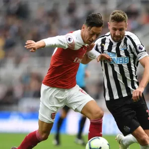 Mesut Ozil (Arsenal) Paul Dummett (Newcastle)