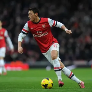 Mesut Ozil: Arsenal's Star Midfielder in Action Against Fulham, Premier League 2013-14 Mesut Ozil: Arsenal's Star Midfielder in Action Against Fulham, Premier League 2013-14