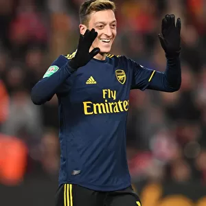 Mesut Ozil Celebrates Arsenal's Four-Goal Lead Over Liverpool in Carabao Cup