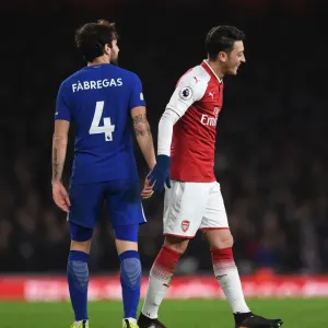 Mesut Ozil and Cesc Fabregas Share a Light-Hearted Moment Amidst Rivalry: Arsenal vs. Chelsea, Premier League 2017-18