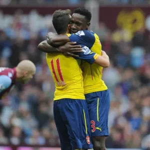 Mesut Ozil and Dany Welbeck Celebrate Arsenal's First Goal vs. Aston Villa (2014-15)