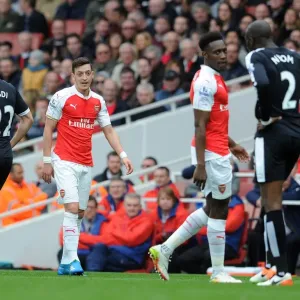 Mesut Ozil in Deep Chat with Allan Nyom during Arsenal vs. Watford, Premier League 2015-16 Mesut Ozil in Deep Chat with Allan Nyom during Arsenal vs. Watford, Premier League 2015-16