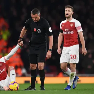 Mesut Ozil in Distress: Referee Andre Marriner Steps In During Arsenal vs. Liverpool Clash (2018-19) Mesut Ozil in Distress: Referee Andre Marriner Steps In During Arsenal vs. Liverpool Clash (2018-19)