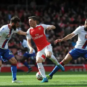 Mesut Özil Dodges Challenges from Joe Ledley and Mile Jedinak in Arsenal vs Crystal Palace, Premier League 2015-16 Mesut Özil Dodges Challenges from Joe Ledley and Mile Jedinak in Arsenal vs Crystal Palace, Premier League 2015-16