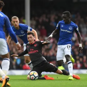 Mesut Ozil Fouled by Idrissa Gueye and Nikola Vlasic in Everton vs Arsenal Premier League Clash Mesut Ozil Fouled by Idrissa Gueye and Nikola Vlasic in Everton vs Arsenal Premier League Clash