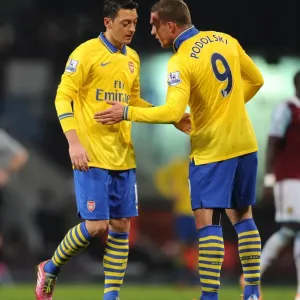 Mesut Ozil and Lukas Podolski (Arsenal). West Ham United 1: 3 Arsenal. Barclays Premier League