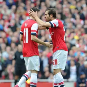Mesut Ozil and Mathieu Flamini Celebrate Arsenal's First Goal Against Everton in FA Cup Quarter-Final Mesut Ozil and Mathieu Flamini Celebrate Arsenal's First Goal Against Everton in FA Cup Quarter-Final