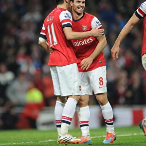 Mesut Ozil and Mikel Arteta Celebrate Arsenal's Victory: Arsenal v Newcastle United, Premier League 2013/14