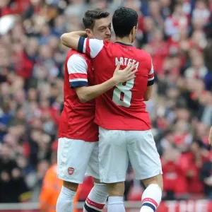 Mesut Ozil and Mikel Arteta Celebrate Arsenal's First Goal Against Everton in FA Cup Quarter-Final, 2014 Mesut Ozil and Mikel Arteta Celebrate Arsenal's First Goal Against Everton in FA Cup Quarter-Final, 2014