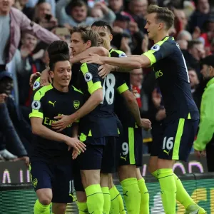 Mesut Ozil, Monreal, Xhaka, and Holding Celebrate Arsenal's Goals Against Stoke City