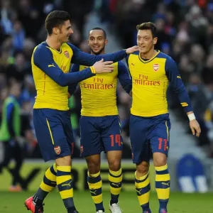Mesut Ozil, Olivier Giroud, and Theo Walcott Celebrate in Print