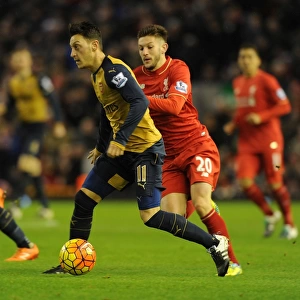 Mesut Ozil Outmaneuvers Adam Lallana: Premier League Showdown between Liverpool and Arsenal (2015-16)