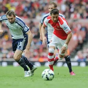 Mesut Ozil Outmaneuvers Gareth McAuley: Arsenal's Thrilling Victory over West Bromwich Albion, Premier League 2014/15 Mesut Ozil Outmaneuvers Gareth McAuley: Arsenal's Thrilling Victory over West Bromwich Albion, Premier League 2014/15