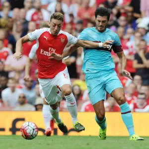 Mesut Ozil Outmaneuvers James Tomkins: Arsenal's Thrilling Start to 2015-16 Premier League Season