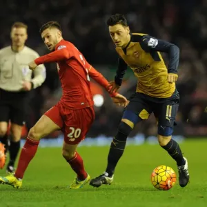 Mesut Ozil Outsmarts Adam Lallana: A Premier League Battle between Arsenal and Liverpool (2015-16) Mesut Ozil Outsmarts Adam Lallana: A Premier League Battle between Arsenal and Liverpool (2015-16)