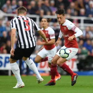 Mesut Ozil and Paul Dummett Clash in Intense Arsenal Victory over Newcastle United at St. James Park (1:2)