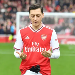 Mesut Ozil in Prayer: Arsenal Football Club's Pre-Match Focus before Arsenal vs West Ham
