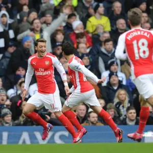 Mesut Ozil and Santi Cazorla Celebrate Goal: Tottenham vs. Arsenal, Premier League 2014-15 Mesut Ozil and Santi Cazorla Celebrate Goal: Tottenham vs. Arsenal, Premier League 2014-15
