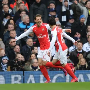 Mesut Ozil and Santi Cazorla Celebrate Goals: Arsenal's Victory at Tottenham Hotspur (2014-15) Mesut Ozil and Santi Cazorla Celebrate Goals: Arsenal's Victory at Tottenham Hotspur (2014-15)