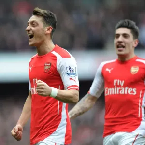 Mesut Ozil Scores the Second Goal: Arsenal's Victory Against Liverpool in the Premier League 2014-15