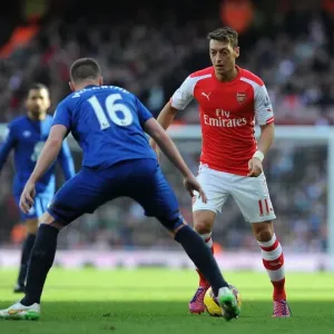 Mesut Ozil Takes on James McCarthy: Arsenal vs. Everton, Premier League 2014-15 Mesut Ozil Takes on James McCarthy: Arsenal vs. Everton, Premier League 2014-15