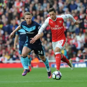 Mesut Ozil vs. Adam Forshaw: A Premier League Battle at Emirates Stadium (2016-17) Mesut Ozil vs. Adam Forshaw: A Premier League Battle at Emirates Stadium (2016-17)