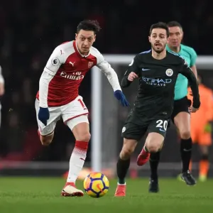 Mesut Ozil vs Bernardo Silva: A Premier League Battle at Arsenal's Emirates Stadium