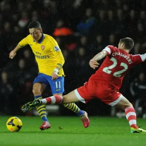Mesut Ozil vs Calum Chambers: Intense Battle at Southampton's St Marys Stadium (Arsenal vs Southampton, Premier League 2013-14) Mesut Ozil vs Calum Chambers: Intense Battle at Southampton's St Marys Stadium (Arsenal vs Southampton, Premier League 2013-14)