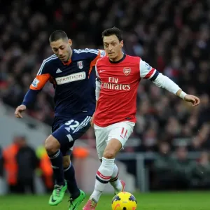 Mesut Ozil vs. Clint Dempsey: A Battle at the Emirates - Arsenal v Fulham, Premier League 2013-14 Mesut Ozil vs. Clint Dempsey: A Battle at the Emirates - Arsenal v Fulham, Premier League 2013-14